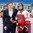 BRIZA Peter (left), IIHF Council Member, and HEINRICH Dominique, who was named Best Player of Austrian team in the game against Korea. Photo: Andrey Basevich
